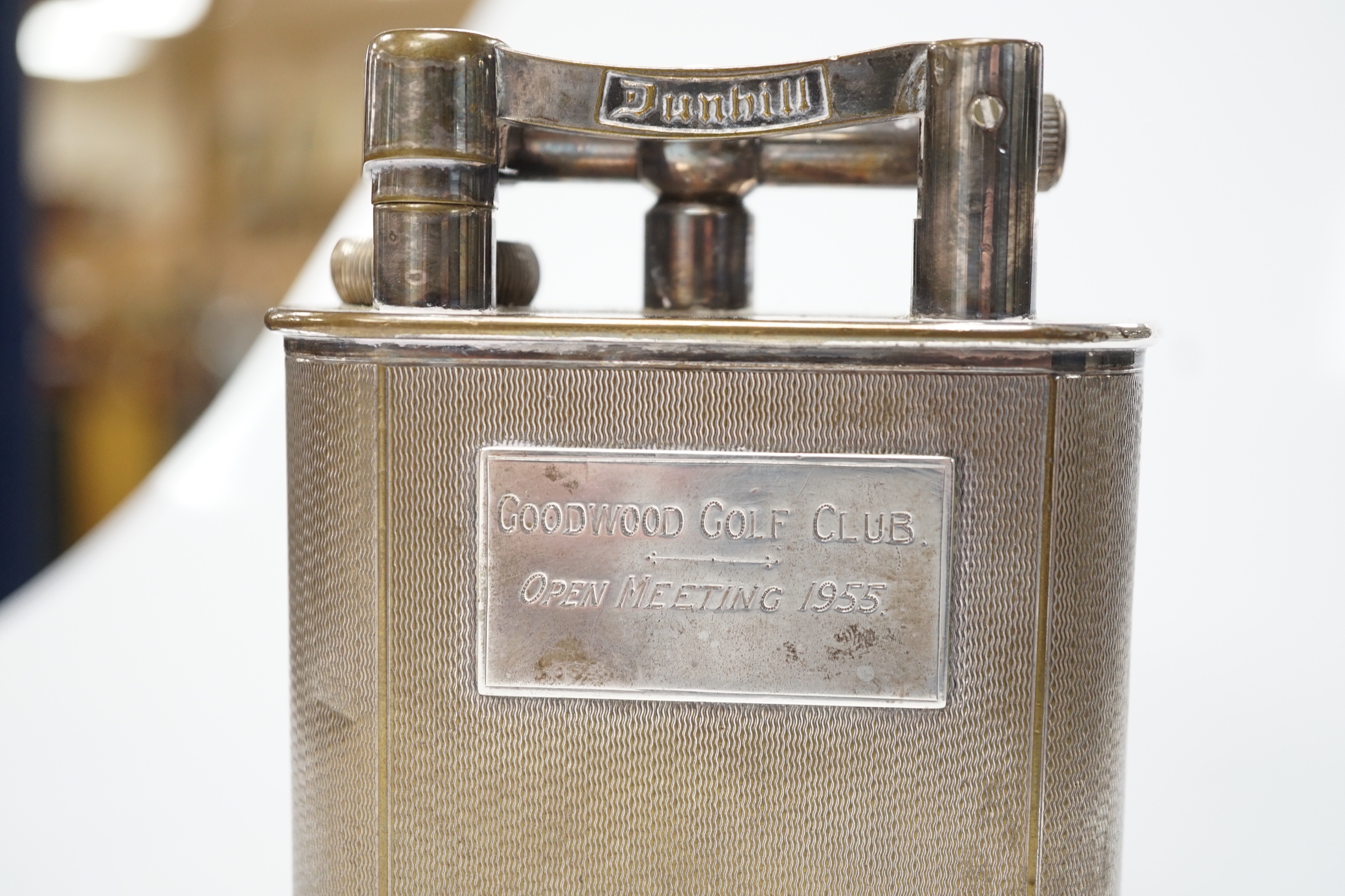 A Dunhill table lighter ‘Goodwood golf club. Open meeting 1955’
